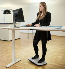 Balance board Active standing behind your desk